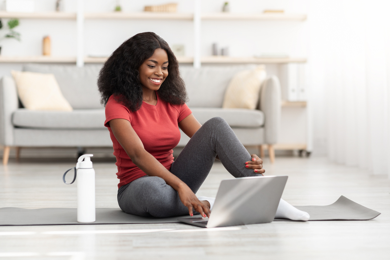 Happy Black Woman Greeting Fitness Coach, Training Online